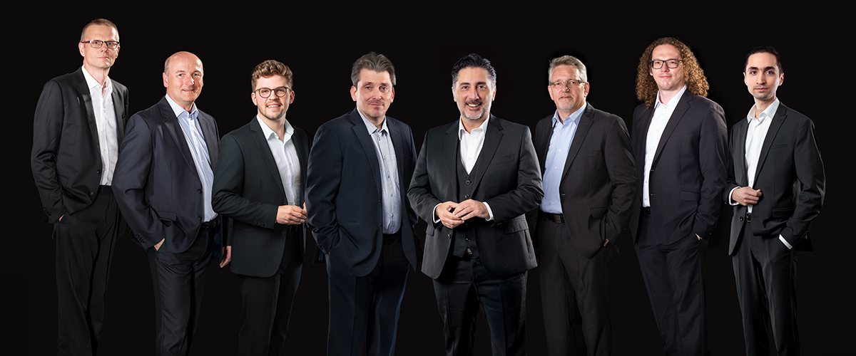 Team picture of the E+H Metrology management team: Juergen Lang, Peter Michel, Dr. Michael Jörger, Tobias Kastrup, Daniel Raseghi, Heiko Rings, Sebastian Koenigsmann, Navid Razeghi